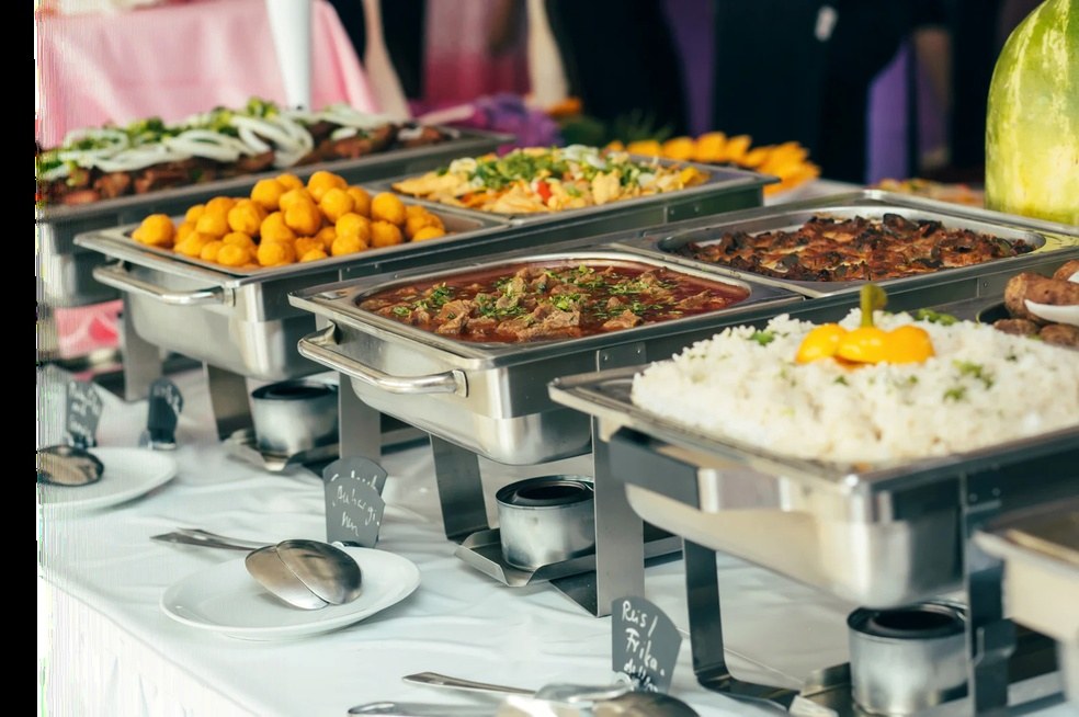 Catering buffet with chafing dishes of Thanksgiving favorites